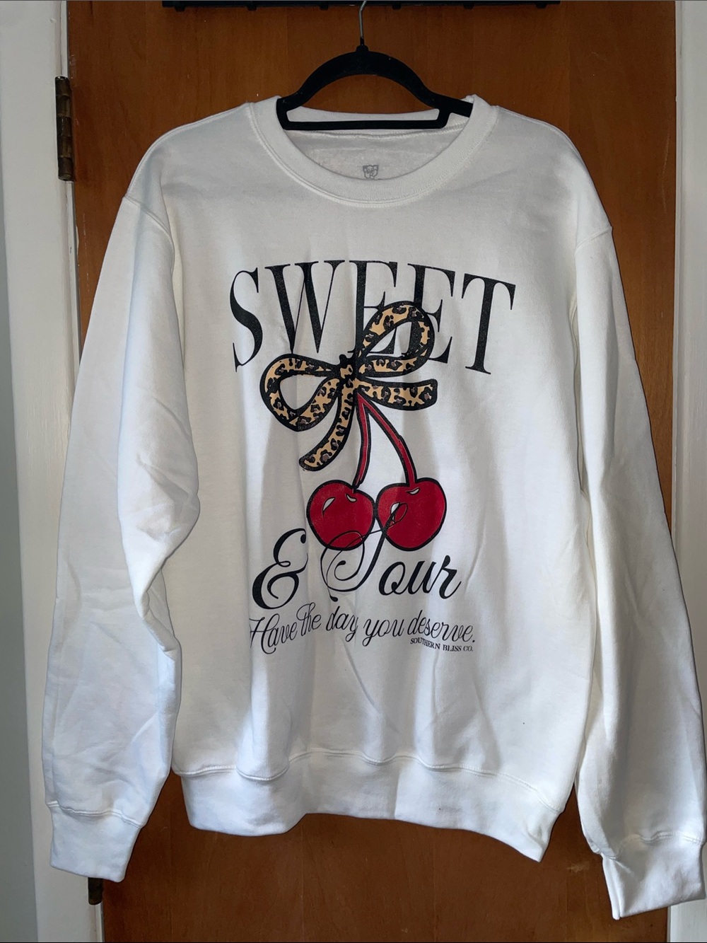 White Crewneck Sweatshirt with Red Cherry Graphic
